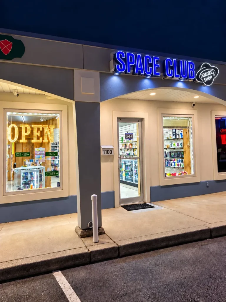 Space Club storefront at night
